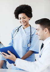 Image showing happy doctors meeting at hospital office