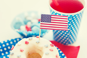 Image showing donut with juice and candies on independence day