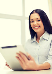 Image showing smiling businesswoman or student with tablet pc