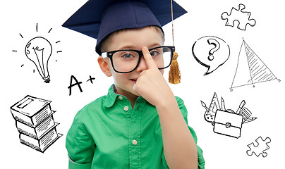 Image showing boy in bachelor hat and eyeglasses over doodles