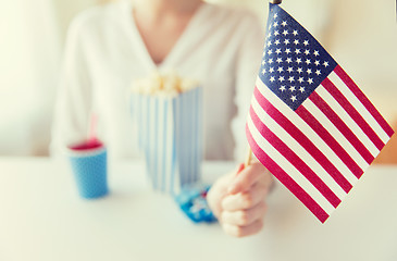 Image showing close up of woman holding american flag