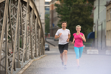 Image showing couple jogging