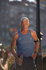 Image showing portrait of handsome senior jogging man