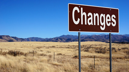 Image showing Changes brown road sign