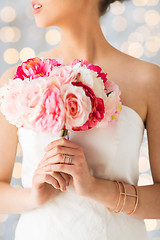 Image showing close up of woman or bride with flower bouquet