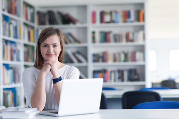 Image showing female student study in school library