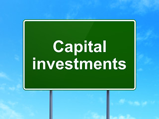 Image showing Currency concept: Capital Investments on road sign background