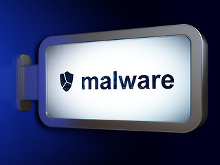 Image showing Security concept: Malware and Broken Shield on billboard background