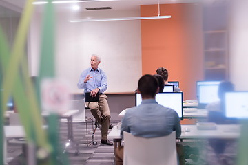 Image showing teacher and students in computer lab classroom