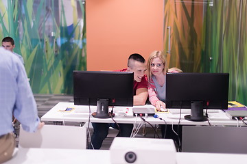 Image showing teacher and students in computer lab classroom