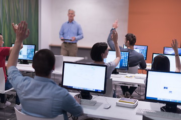 Image showing teacher and students in computer lab classroom