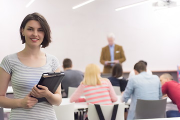 Image showing portrait of happy female student in classroom