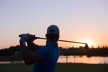 Image showing golfer hitting long shot