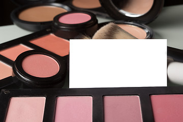 Image showing makeup cosmetics for eyes and bussiness card