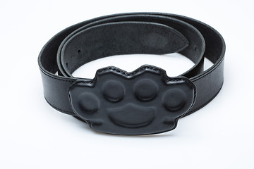 Image showing black belt with a buckle in the form of brass knuckles