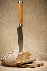 Image showing A slice of bread with butter 