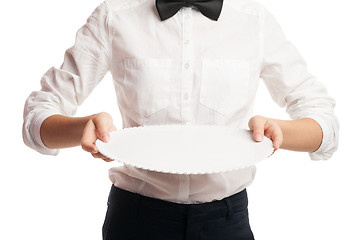 Image showing Close-up of waitress holding tray