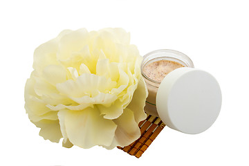 Image showing Spa cosmetic cream and flower isolated on white