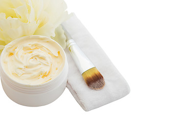 Image showing Spa cosmetic cream, headband and applicator isolated on white
