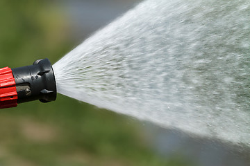 Image showing stream of water from a fire hose