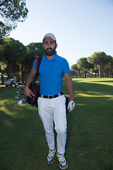 Image showing golf player walking