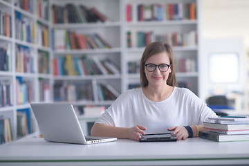 Image showing female student study in school library