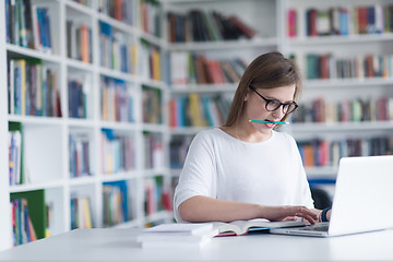 Image showing female student study in school library