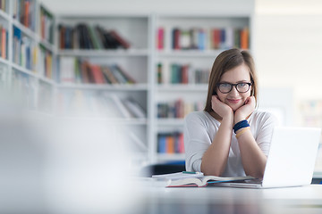 Image showing female student study in school library