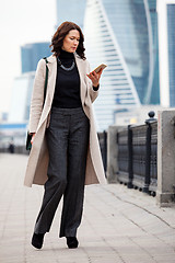 Image showing woman messaging with smartphone