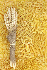 Image showing Dried Pasta and Wheat Background