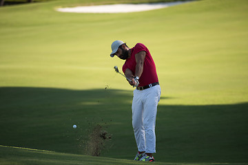 Image showing golf player hitting long shot