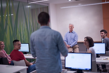 Image showing student answering a question in classroom