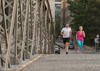 Image showing couple jogging