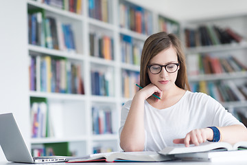 Image showing female student study in school library