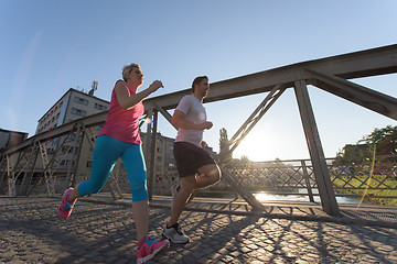 Image showing couple jogging