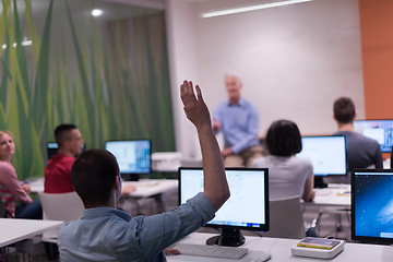 Image showing student answering a question in classroom