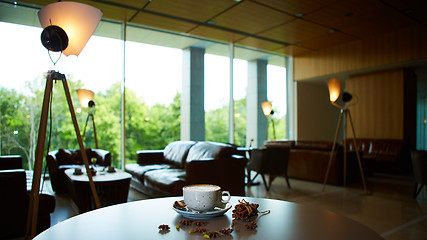 Image showing Cup of latte on the table