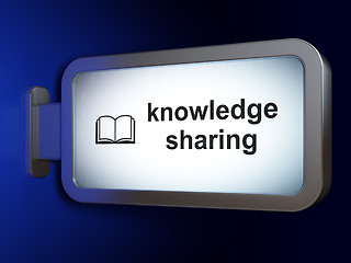 Image showing Learning concept: Knowledge Sharing and Book on billboard background