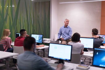 Image showing teacher and students in computer lab classroom