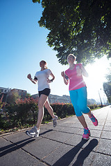 Image showing female friends jogging