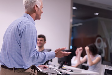 Image showing teacher and students in computer lab classroom