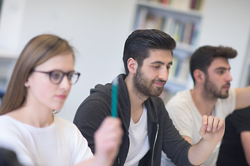 Image showing group of students study together in classroom