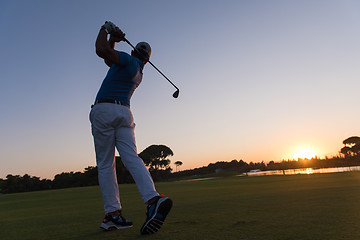 Image showing golfer hitting long shot