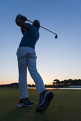 Image showing golfer hitting long shot