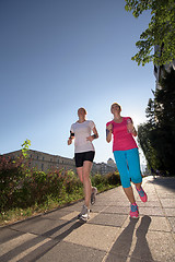 Image showing female friends jogging