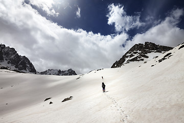 Image showing Two hikers in snowy mountains