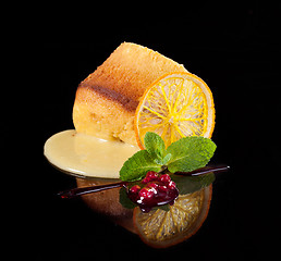 Image showing fresh dessert decorated with orange and mint leaf