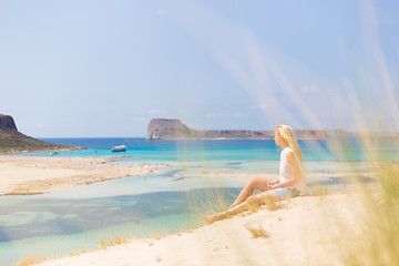 Image showing Relaxed Happy Woman Enjoying Sun on Vacations.