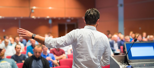 Image showing Public speaker giving talk at Business Event.