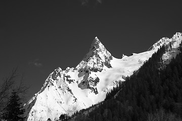 Image showing Black and white mountain peak in snow